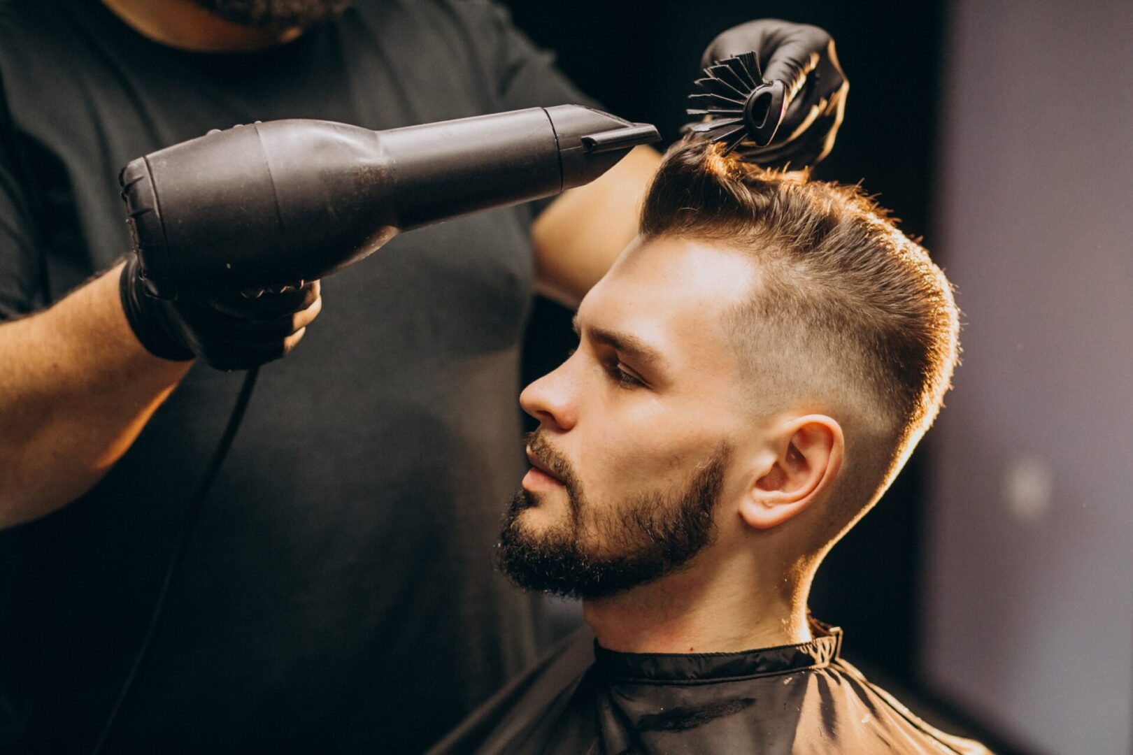 handsome-man-barber-shop-styling-hair-min